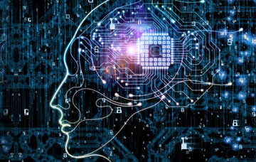 The outline of a face profile with imagery of a microchip and network connections within the head